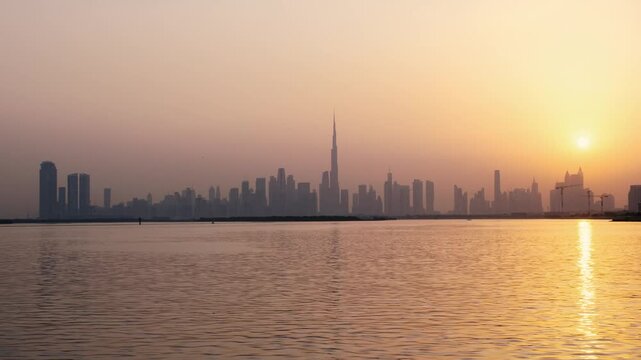 Timelapse of Dubai skyline with burj khalifa dubai downtown and business bay modern buildings architecture landscape | 4k time lapse
