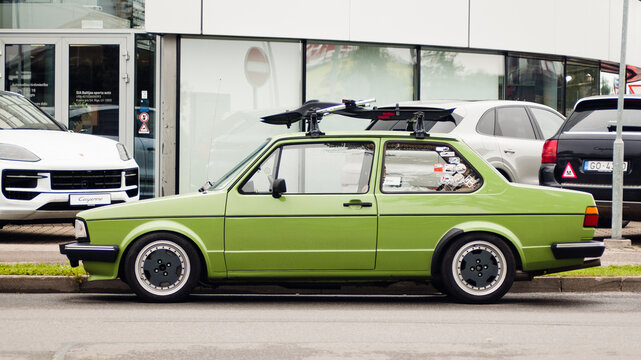 Riga, Latvia - July 31, 2025: A lime green Volkswagen Jetta from the 80s on the street