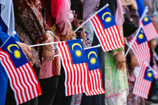 Malaysians holding the Malaysian flag is also known as Jalur Gemilang