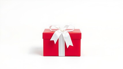 Obraz premium Red gift box with white ribbon and bow, centered product shot on clean background.