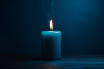 Blue candles lit separately on a dark blue background.