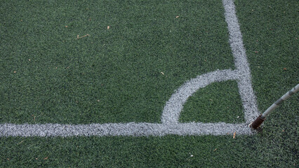 corner of the futsal field with poles and flags