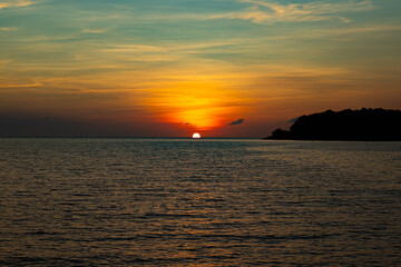 Sun setting out on West Philippines Sea at resort in Bataan Philippines 2024 