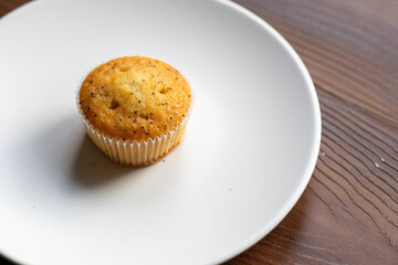 muffins on a wooden table	