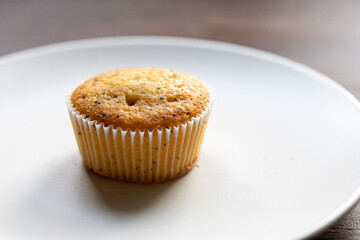 muffins on a wooden table	