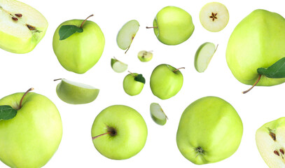 Fresh green apples swirling in air against white background