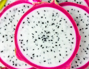 A vibrant close-up macro shot of freshly sliced dragon fruit, revealing the intricate texture of the white pulp and black seeds, creating a healthy food pattern