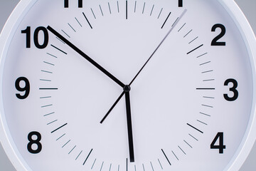 Clock tells the time of work and life. Time photography in studio. Concept of time and punctuality.