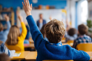 Eager Young Student in Blue Sweater Raising Hand in Class