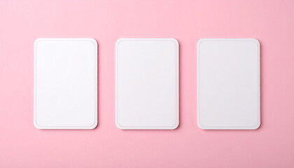 Three blank trading cards with rounded corners in a row on pink background. Isolated mockup