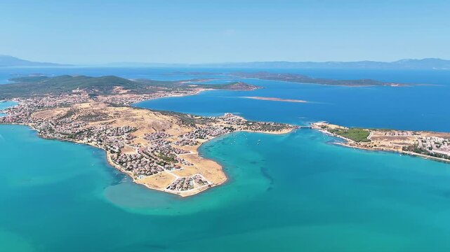 Drone view of Ayvalik in Balikesir in Turkiye. Magnificent views of the turquoise sea and islands.