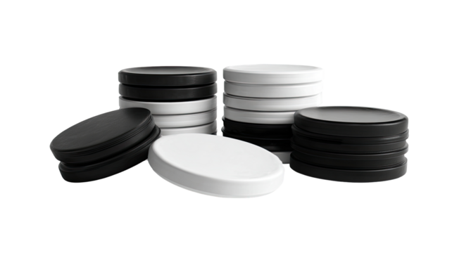 Stacks of black and white game pieces