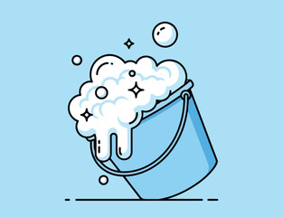 Blue bucket filled with soapy water and bubbles on light blue background