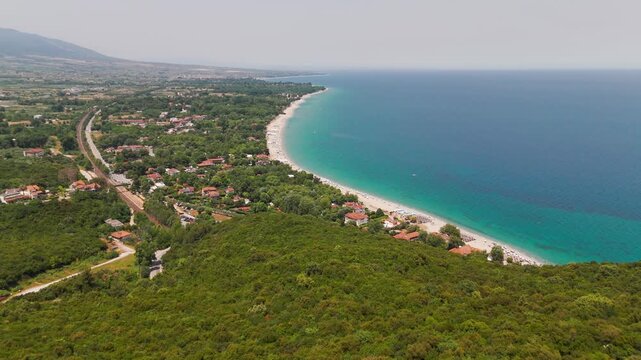 High Altitude Aerial Drone Shot Of Platamon Castle And Aegean Sea In Pieria, Central Macedonia, Greece On A Sunny Summer Afternoon.