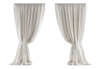 Pair of light beige/cream-colored curtains.  Full-length, draped, tied at the bottom.  Neutral backdrop for a room