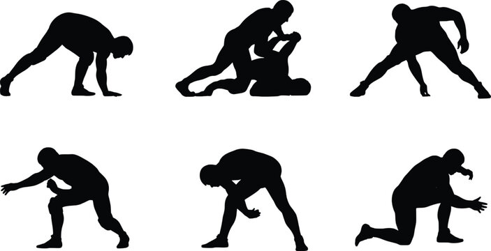 Diverse silhouettes of athletes performing wrestling moves and martial arts poses isolated on white