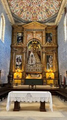 Obraz premium Grand Church Interior with Ornate Baroque Altarpiece and Frescoed Ceiling: Majestic Sacred Architecture and Religious Art Heritage in a Historic European Cathedral