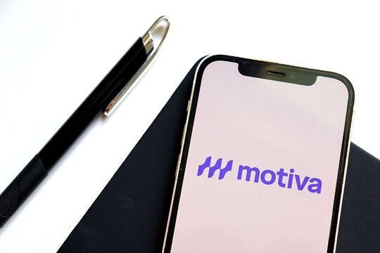 Salvador, Brazil - August 28, 2025: Motiva Logo on Smartphone Screen. Brazilian Infrastructure and Mobility Company (Formerly Grupo CCR). 