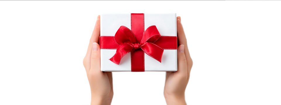 Hands holding a gift box with a red ribbon bow isolated on a white background top view The white present is for a holiday or birthday celebration Concept of gr