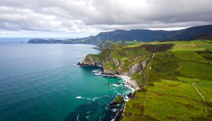 Fototapeta premium Coastal landscape, dramatic cliffs, and lush green hills