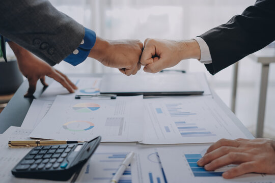 Business handshake for teamwork of business merger and acquisition,successful negotiate,hand shake,two businessman shake hand with partner to celebration partnership and business deal concept