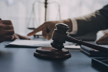 Lawyer explained to the client about the law that must be brought against the court case.