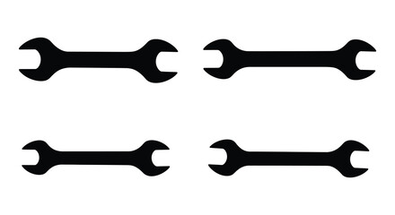 Four black wrenches on a white background in a simple design
