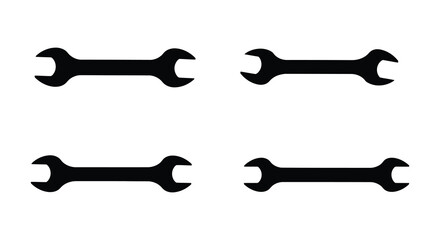 Four black adjustable wrenches on a white background