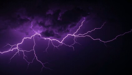 Striking purple lightning illuminates the night sky, showcasing nature's raw power and dramatic beauty.