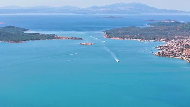 Drone view of Ayvalik in Balikesir in Turkiye. Magnificent views of the turquoise sea and islands.