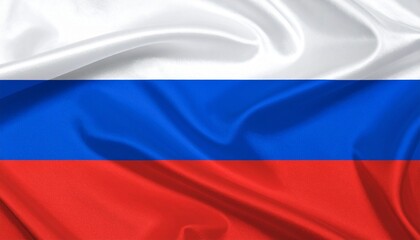 Fototapeta premium French national flag waving against a blue sky with clouds.