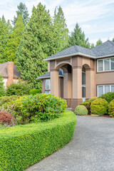 Entrance of luxury house in summer with nice landscape in Vancouver, Canada, North America. Day time on August 2025.