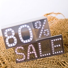 Sale sign on a burlap background