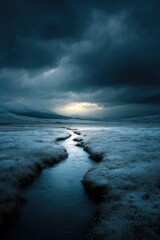 Fototapeta premium A tranquil stream meanders through a frosted landscape under a stormy sky