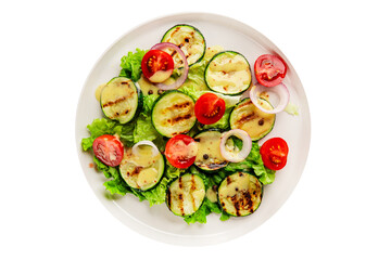 Salad grilled zucchini, tomato, lettuce tasty snack fresh delicious gourmet food background on the table rustic food top view copy space keto and paleo diet vegan and vegetarian food