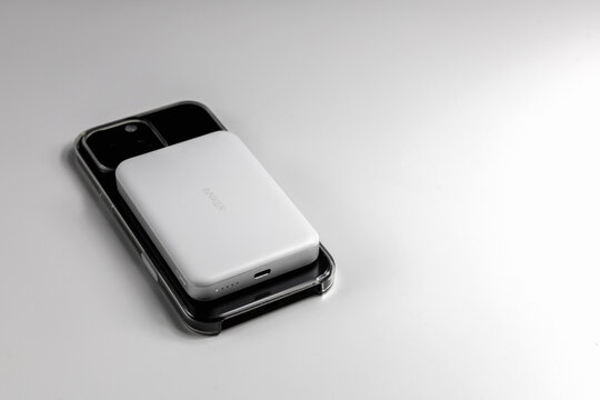 Iphone connected to anker magsafe power bank