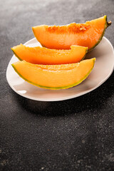 Melon Charente ripe sweet fruit tasty snack fresh delicious gourmet food background on the table rustic food top view copy space keto and paleo diet vegan and vegetarian food