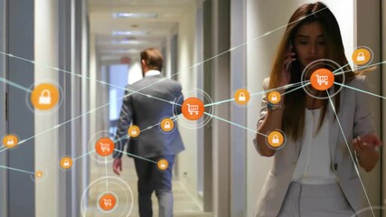 Animation of network of connections with icons over diverse business people in office - Powered by Adobe