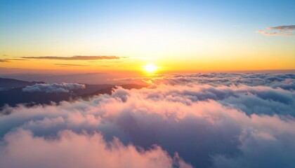 Spectacular aerial view of sunrise above the clouds with beautiful colors and horizons