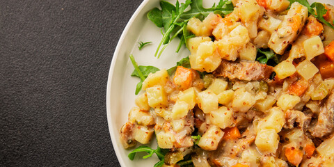Potato salad with smoked fish tasty snack fresh delicious gourmet food background on the table...