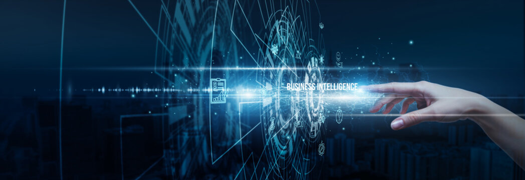 Hand of analyst touching powerful business intelligence data visualization reporting, dashboard insights strategy decision-making KPIs performance analytics, and innovation.