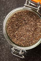 Chia seeds healthy superfood tasty snack fresh delicious gourmet food background on the table rustic food top view copy space keto and paleo diet vegan and vegetarian food