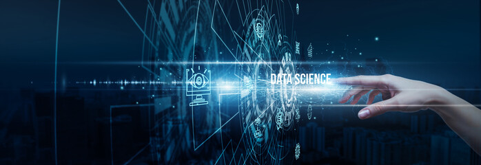 Hand of a data analyst touching predictive data science data algorithms, statistics, modeling machine learning insights analytics visualization, and processing solutions.