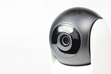 close-up shot lens of home security camera on yellow background