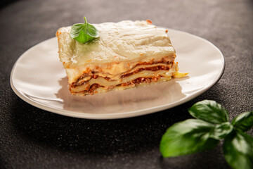 Lasagna bolognese béchamel sauce, meat, cheese second course tasty snack fresh delicious gourmet food background on the table rustic food top view copy space