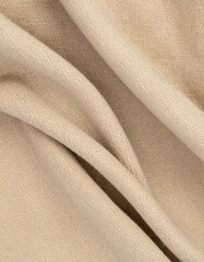 Neutral Beige Fabric Texture Background With Subtle Folds and Soft Lighting