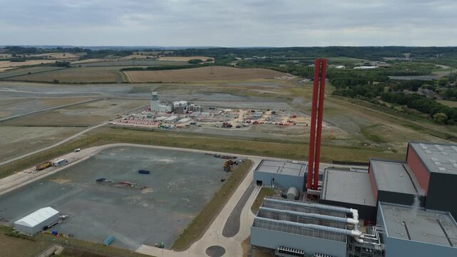 Aerial drone view of Millbrook and Rookery industrial power plant, energy generation from gas and oil, smoke stacks, Bedford England UK