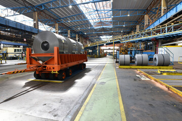 industrial plant for the production of sheet metal in a steel mill