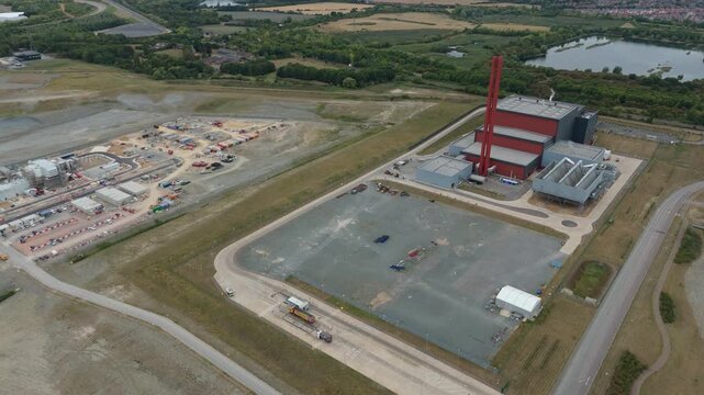 Aerial drone view of Millbrook and Rookery industrial power plant, energy generation from gas and oil, smoke stacks, Bedford England UK