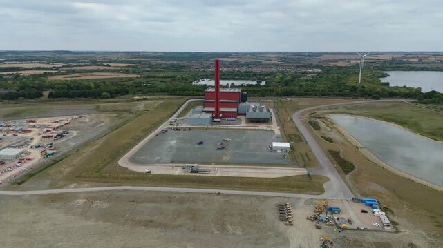 Aerial drone view of Millbrook and Rookery industrial power plant, energy generation from gas and oil, smoke stacks, Bedford England UK